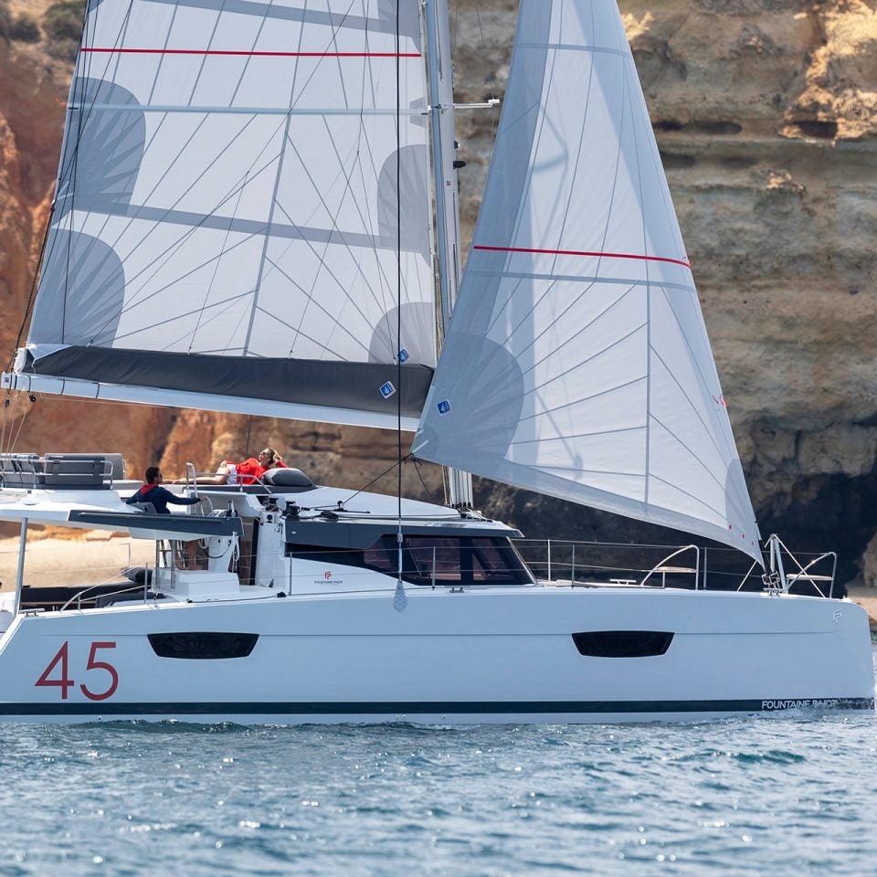 Sailing Elba 45 catamaran sailboat with couple onboard