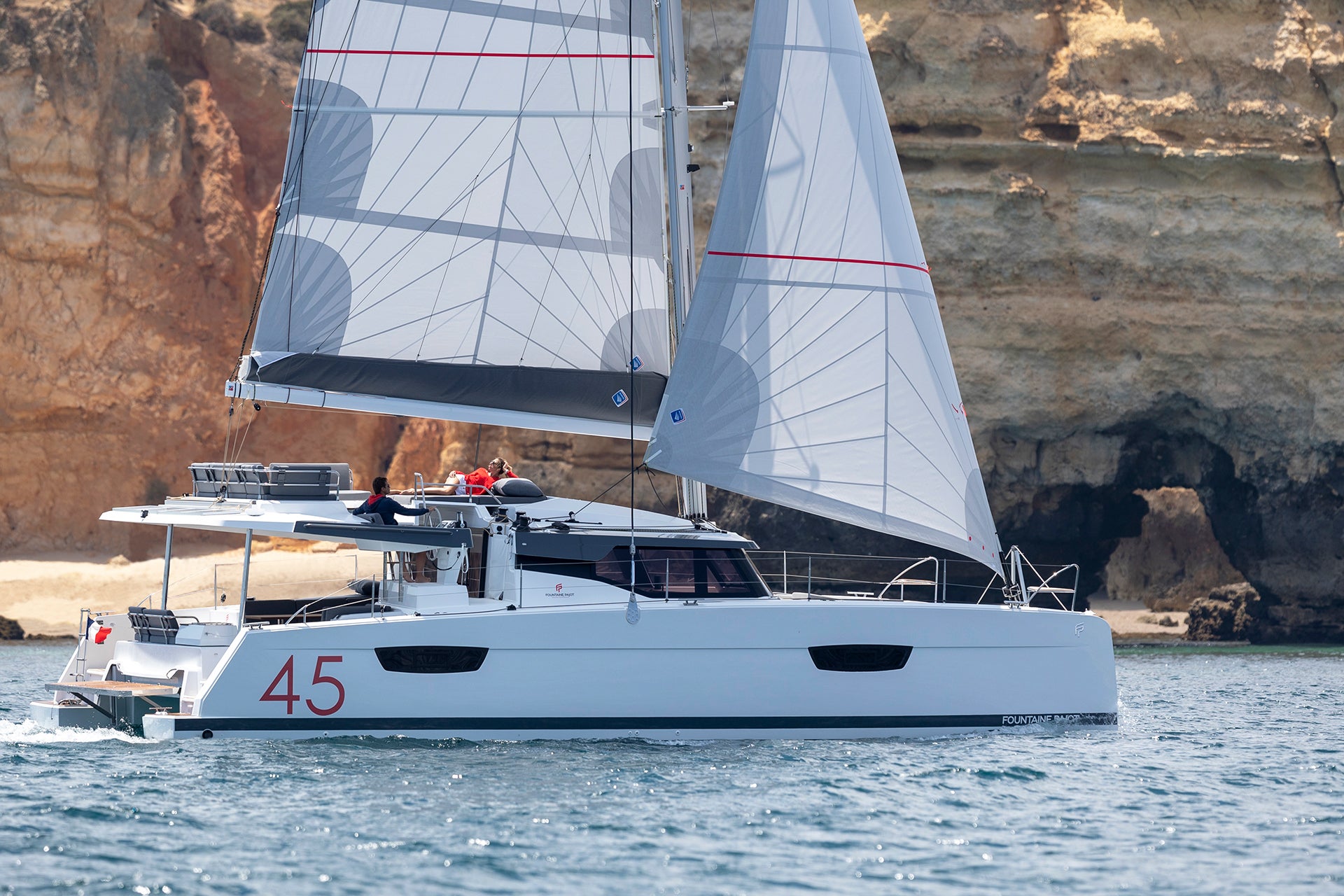 Sailing Elba 45 catamaran sailboat with couple onboard