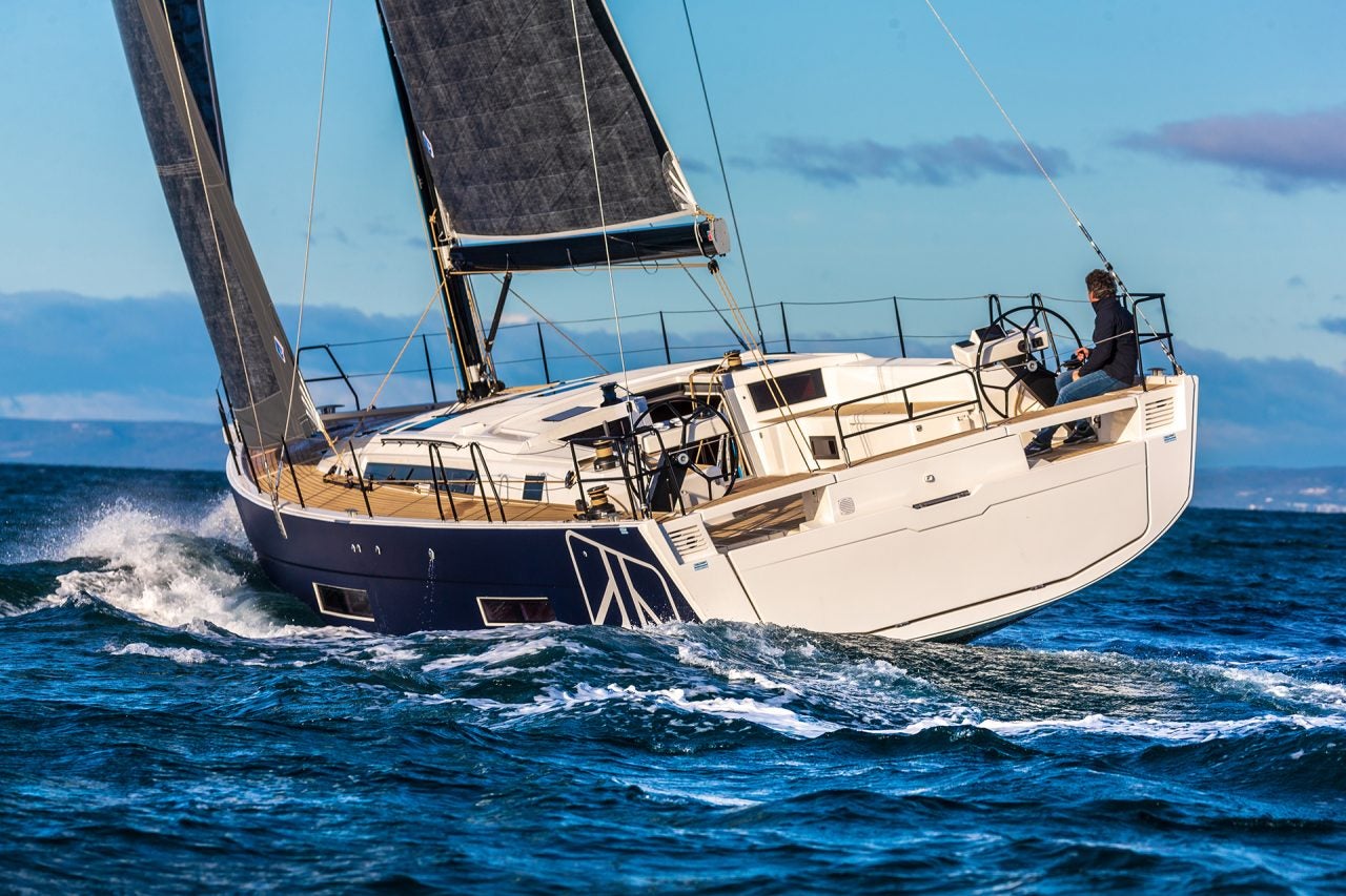 Dufour 530 monohull sailing with man at helm