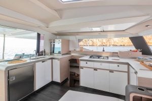 Kitchen aboard the Elba 45 sailing catamaran with water view