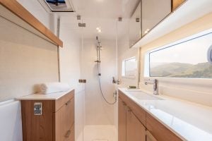 Owners suite bathroom with large window and shower on a Bali Catsmart