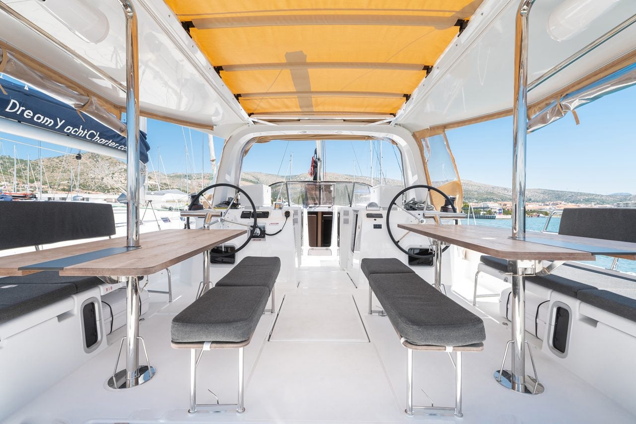 Sun Loft47 sailing monohull cockpit dining area and dual helms