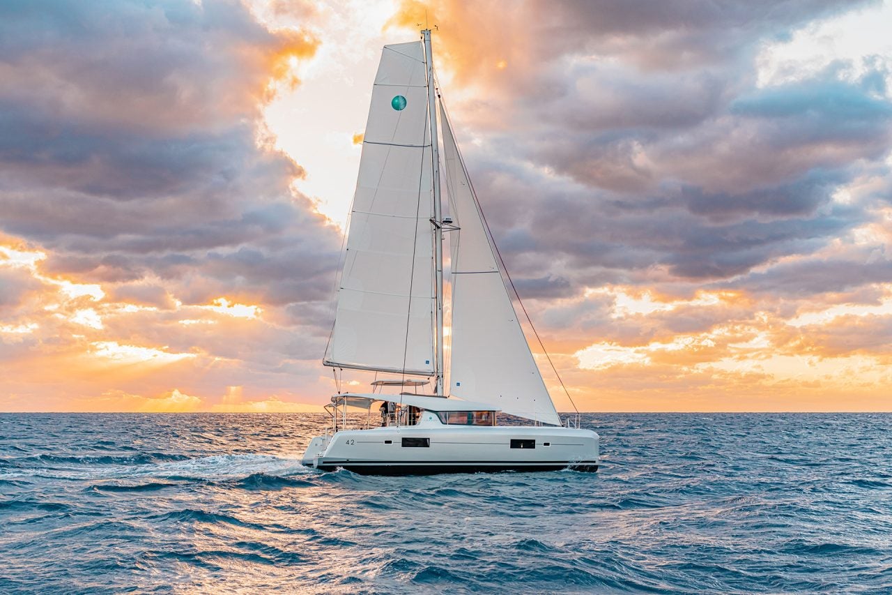 Lagoon 42 sailing catamaran sailing at sunset