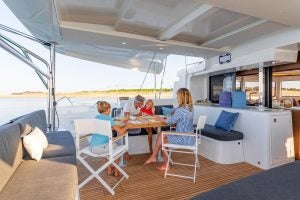 Family outdoor dining on the Lagoon 46 catamaran