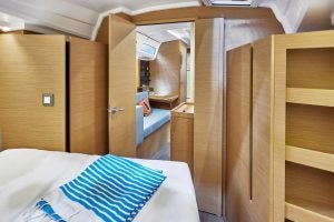 Sun Odyssey 380 sailboat cabin with light wood interior