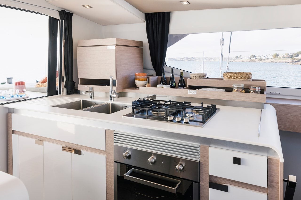 Fountaine Pajot Aura 51 catamaran kitchen sink and stovetop