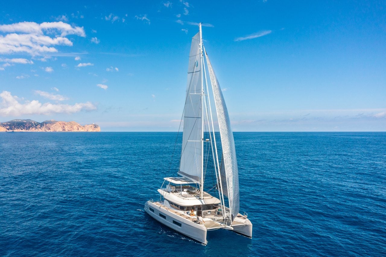 Aerial view of the Lagoon 60 luxury yacht under sail